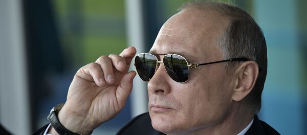 Президент РФ В. Путин, архивное фото - Sputnik Тоҷикистон