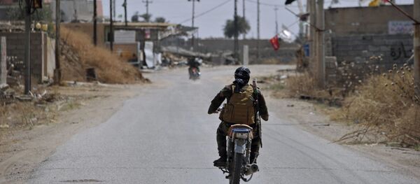 Бойцы шиитского ополчения Хашд аш-Шааби (Силы народного ополчения), архивное фото - Sputnik Тоҷикистон