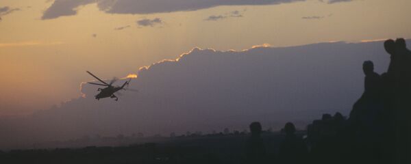 Боевой вертолет, архивное фото - Sputnik Тоҷикистон