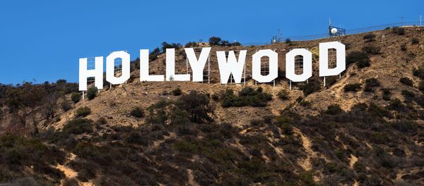 Знаменитая надпись Holywood в США, архивное фото Знаменитая надпись Holywood в США, архивное фото - Sputnik Таджикистан