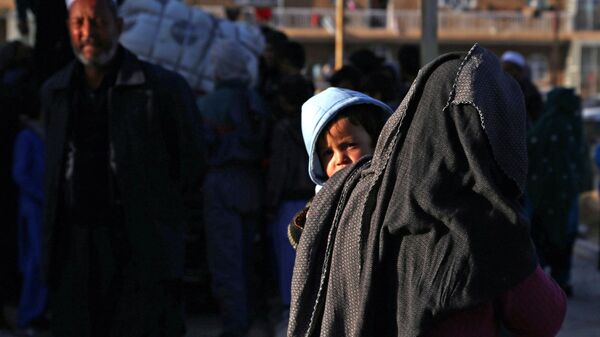 Беженцы из провинции Газни в Афганистане - Sputnik Тоҷикистон