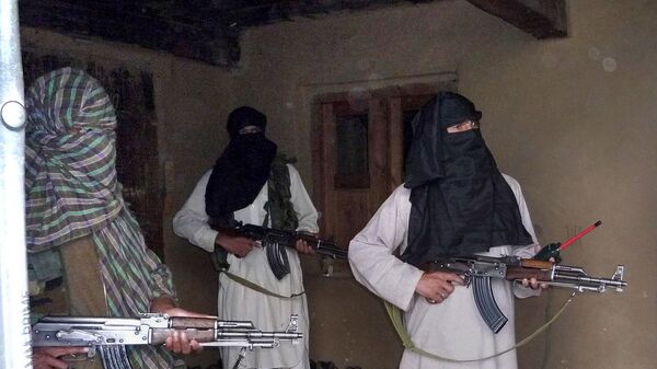 Вооруженные сторонники движения ИГИЛ, архивное фото - Sputnik Таджикистан