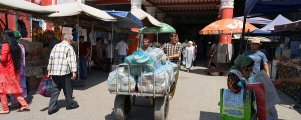 На рынке Панчшанбе, архивное фото На рынке Панчшанбе, архивное фото - Sputnik Тоҷикистон