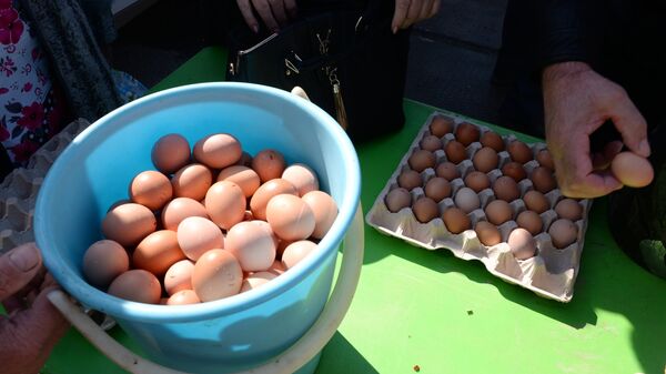 Trade at a city food pre-Easter fair held on Karl Marx Square in Novosibirsk. (File) - Sputnik Тоҷикистон