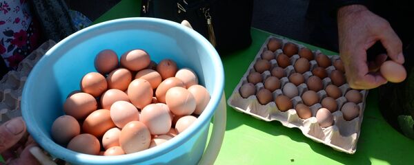 Trade at a city food pre-Easter fair held on Karl Marx Square in Novosibirsk. (File) - Sputnik Тоҷикистон