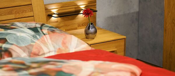 Кровать в номере, архивное фото Кровать в номере, архивное фото - Sputnik Таджикистан