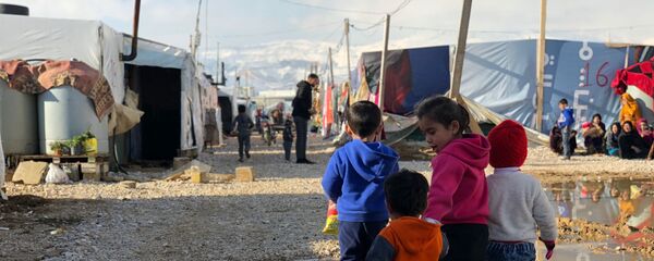 Пострадавший от удара стихии лагерь беженцев Абу-Мазен в поселении Барэльяс в долине Бекаа - Sputnik Тоҷикистон