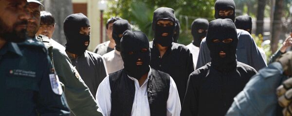 Боевики ИГ (террористическая организация, запрещена в РФ) и движения Талибан в полицейском отделении в Афганистане - Sputnik Таджикистан