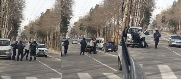 Задержание водителя который оскорбил сотрудника  БДА в Душанбе - Sputnik Тоҷикистон