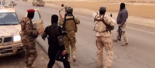 Боевики запрещенного в РФ Исламского государства Ирака и Леванта (ИГИЛ) Боевики запрещенного в РФ Исламского государства Ирака и Леванта (ИГИЛ) - Sputnik Таджикистан