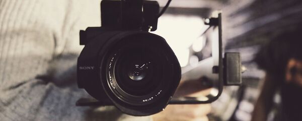 Видеокамера, архивное фото Видеокамера, архивное фото - Sputnik Таджикистан