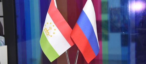 Флаг России и Таджикистана - Sputnik Тоҷикистон