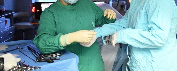 Врачи в операционной, архивное фото - Sputnik Таджикистан