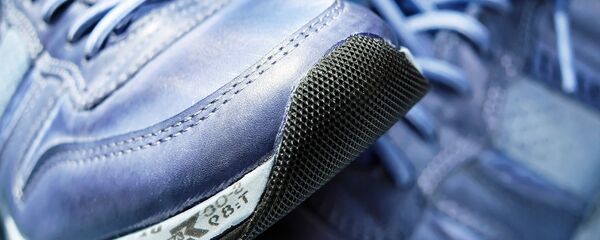 Кроссовки, архивное фото - Sputnik Тоҷикистон