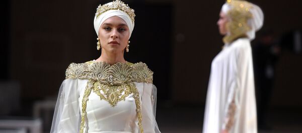 Участницы модного показа «RUSSIA-OIC FASHIONWAY 2019» в рамках XI Международного экономического саммита Россия — Исламский мир: KazanSummit Участницы модного показа «RUSSIA-OIC FASHIONWAY 2019» в рамках XI Международного экономического саммита Россия — Исламский мир: KazanSummit - Sputnik Тоҷикистон