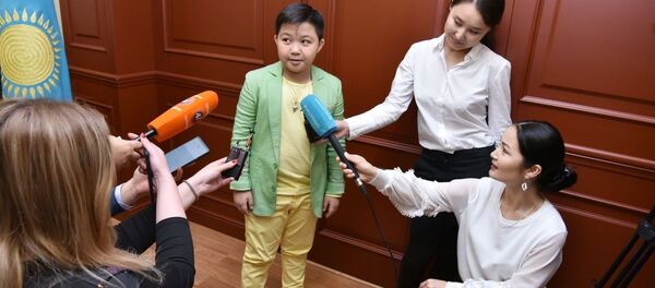 Экс-участник шоу Голос. Дети Ержан Максим - Sputnik Таджикистан