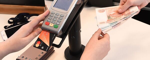 Оплата банковской картой, архивное фото - Sputnik Тоҷикистон
