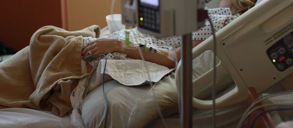Женщина на больничной койке в больнице - Sputnik Тоҷикистон