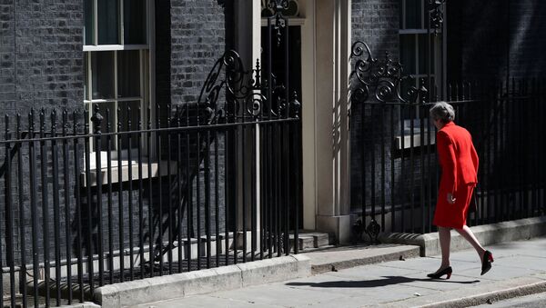 Премьер-министр Великобритании Тереза Мэй в Лондоне. 24 мая 2019 - Sputnik Таджикистан