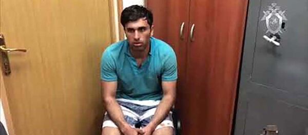 Видео допроса задержанного по делу об убийстве мастера спорта по греко римской борьбе в Москве - Sputnik Тоҷикистон