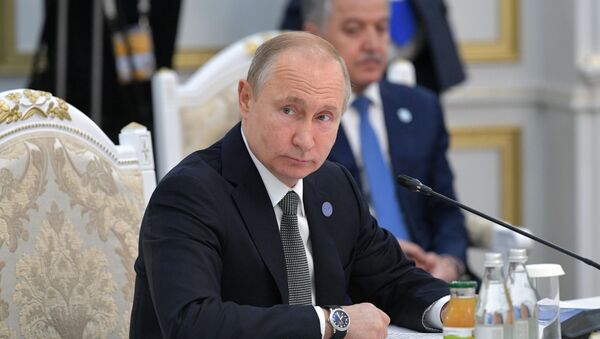 Президент РФ Владимир Путин принимает участие в заседании Совета глав государств - членов Шанхайской организации сотрудничества (ШОС) - Sputnik Таджикистан