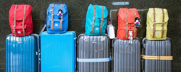 Чемоданы в аэропорту Чемоданы в аэропорту - Sputnik Таджикистан