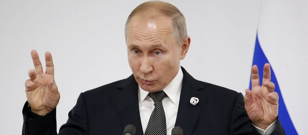  Президент РФ В. Путин на пресс-конференции на саммите G20 в Осаке - Sputnik Таджикистан