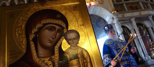 Освящение образа Божьей Матери Казанской, написанного для храма в Сирии Освящение образа Божьей Матери Казанской, написанного для храма в Сирии - Sputnik Таджикистан