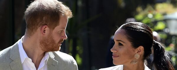 Британский принц Гарри и Меган, герцогиня Сассекс во время посещения андалузских садов в Рабате (25 февраля 2019). Марокко - Sputnik Таджикистан