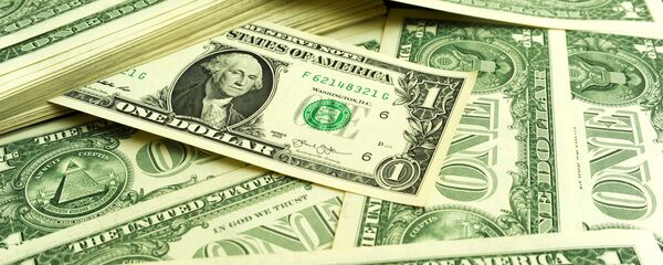 Банкноты номиналом 1 доллар США. - Sputnik Таджикистан