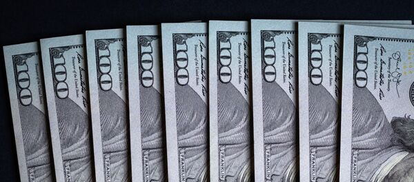 Купюры американских долларов - Sputnik Таджикистан