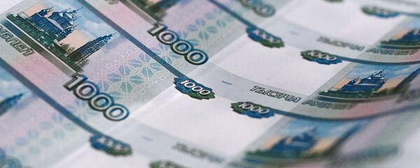 Листы с денежными купюрами  - Sputnik Таджикистан