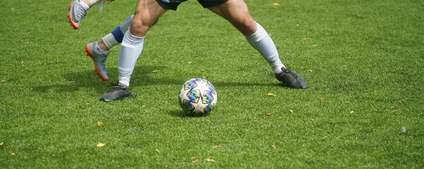 Футболисты на поле, архивное фото - Sputnik Тоҷикистон