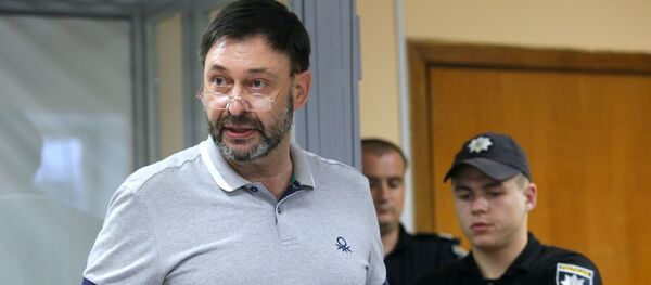 Заседание суда по делу журналиста К. Вышинского в Киеве - Sputnik Таджикистан