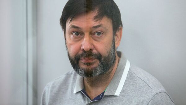 Заседание суда по делу журналиста К. Вышинского в Киеве - Sputnik Таджикистан