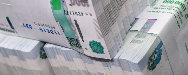 Пачки с банкнотами номиналом одна тысяча рублей - Sputnik Таджикистан