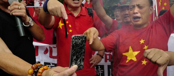 Митинг против торговой политики президента США Дональда Трампа в Гонконге - Sputnik Таджикистан