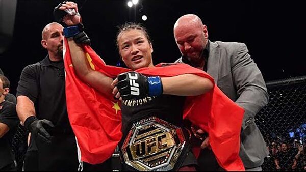 Чжан Вэйли стала первым чемпионом Китая по UFC -  видео - Sputnik Тоҷикистон