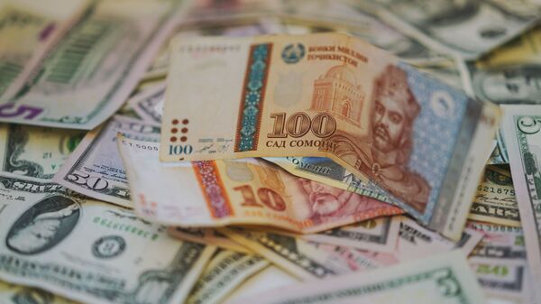 Сомони и доллары, архивное фото - Sputnik Таджикистан