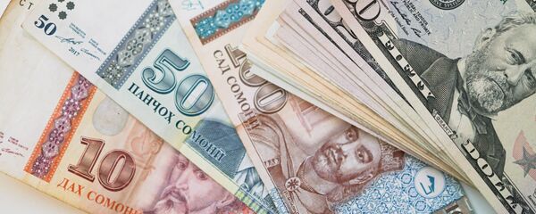 Сомони и доллары, архивное фото  - Sputnik Тоҷикистон