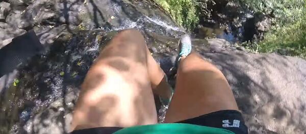 Болезненное падение с Гавайского водопада - Sputnik Тоҷикистон