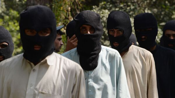 Боевики ИГ и движения Талибан (запрещены в РФ)  в полицейском отделении в Афганистане - Sputnik Таджикистан