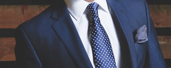 Мужчина в деловом костюме, архивное фото - Sputnik Таджикистан