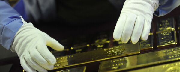 Золотые слитки, архивное фото - Sputnik Таджикистан