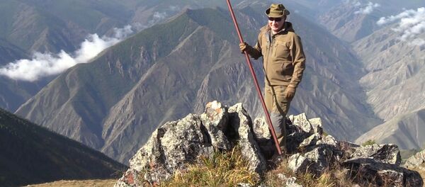 Путин на отдыхе в сибирской тайге - Sputnik Тоҷикистон