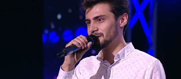 Чоршанбе Аловатов на конкурсе - Sputnik Тоҷикистон