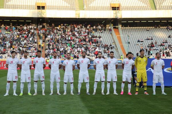 Футболисты на матче Кубка мира между командами Марокко и Ирана - Sputnik Таджикистан
