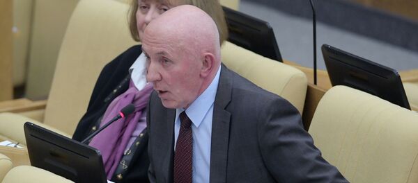 Первый заместитель председателя комитета Государственной Думы по государственному строительству и законодательству Юрий Синельщиков - Sputnik Таджикистан