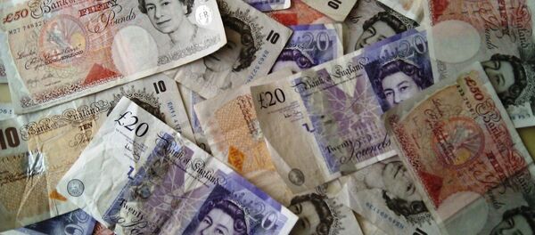 Фунты стерлингов, архивное фото - Sputnik Тоҷикистон