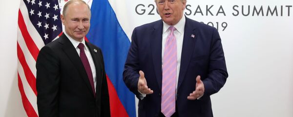 Президент РФ Владимир Путин и президент США Дональд Трамп - Sputnik Тоҷикистон